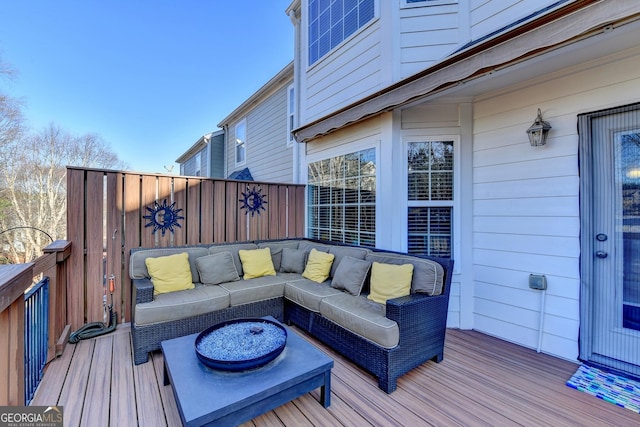 deck featuring outdoor lounge area