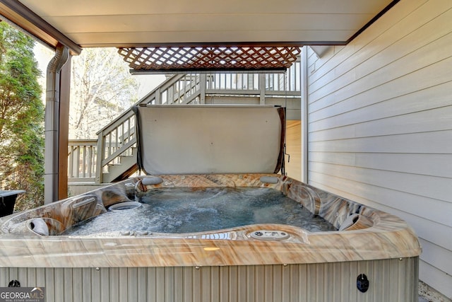 details featuring a jacuzzi and stairs