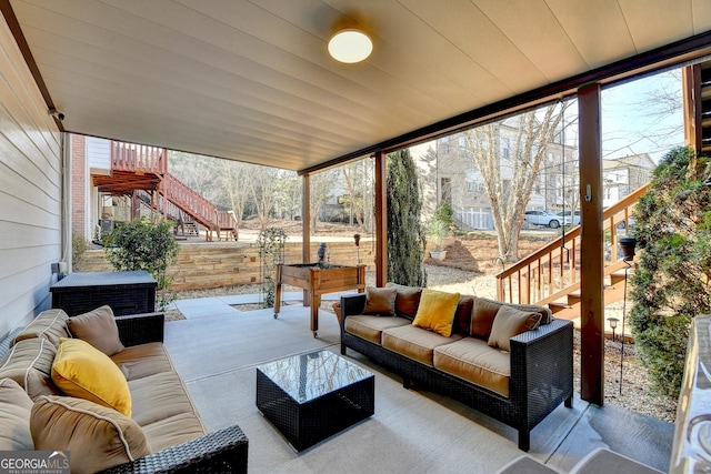 sunroom with wooden ceiling