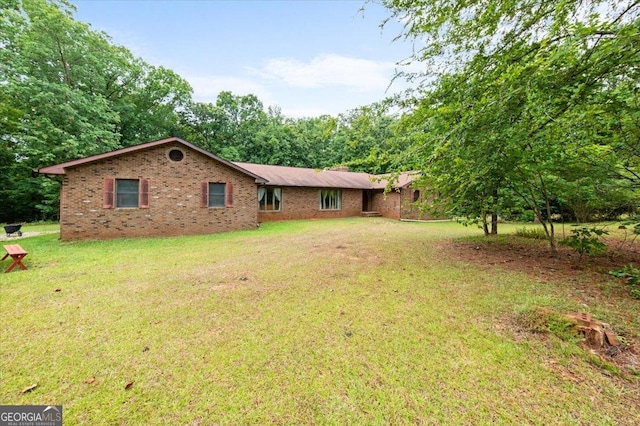 view of front of home with a front lawn