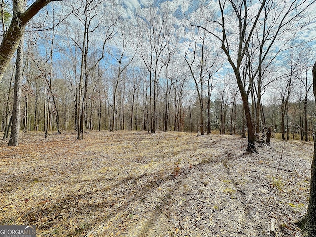 view of landscape with a view of trees