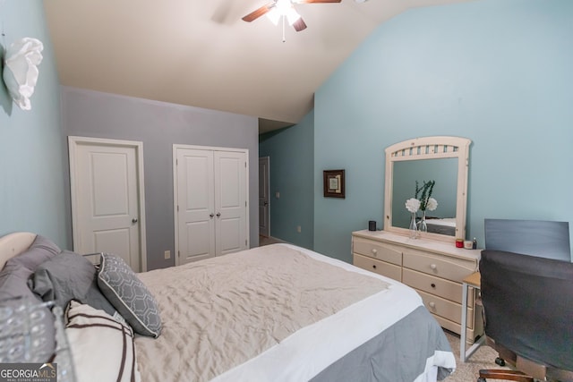 carpeted bedroom with lofted ceiling and ceiling fan