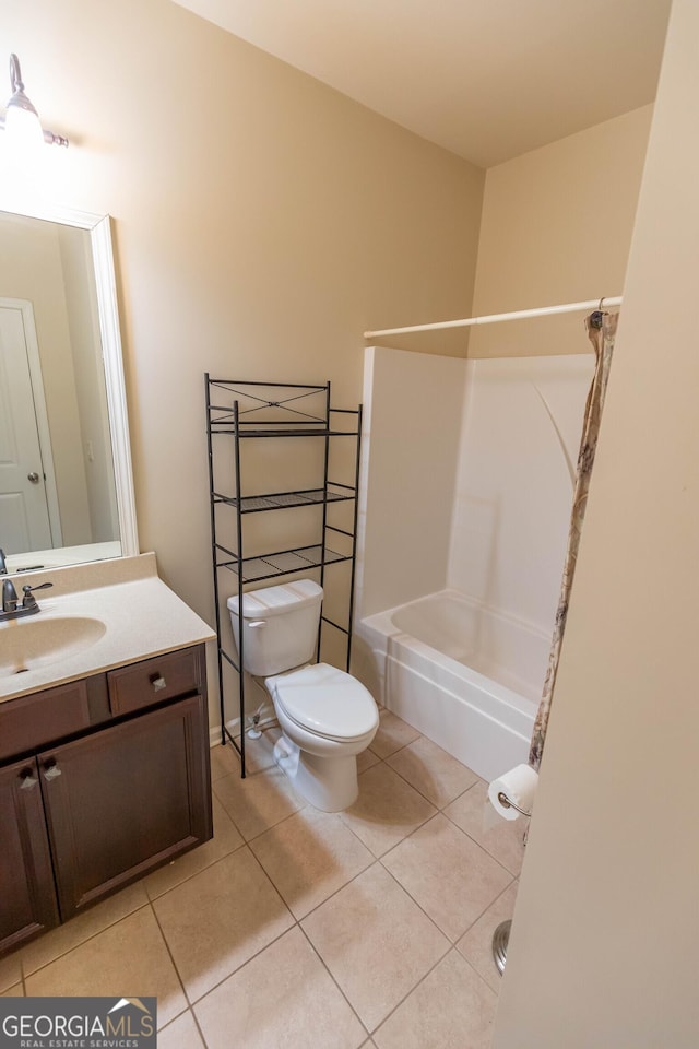 full bathroom with vanity, bathing tub / shower combination, toilet, and tile patterned floors