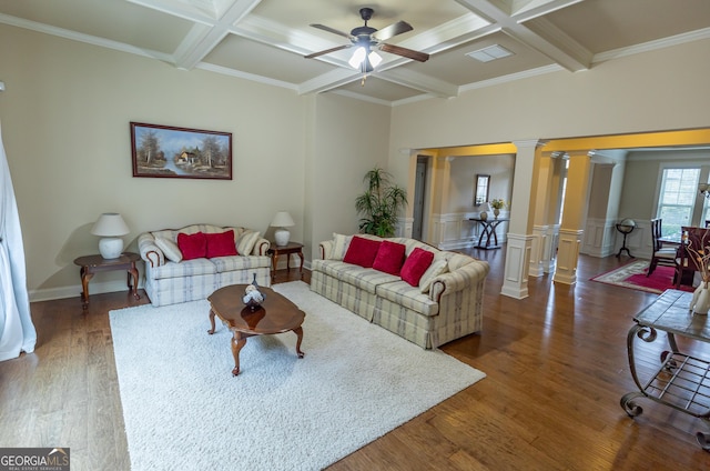 living room with decorative columns, dark wood-type flooring, beam ceiling, and coffered ceiling