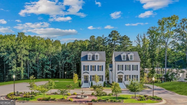 view of front of home with a front lawn