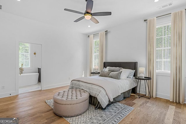 bedroom with ceiling fan and light hardwood / wood-style floors