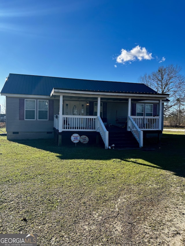 view of front of home featuring a porch and a front yard