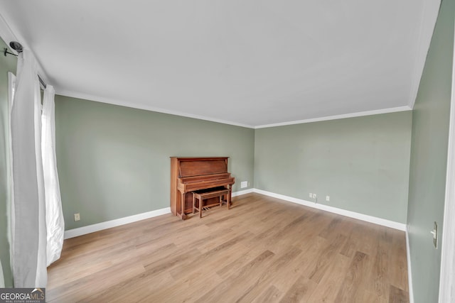 1706 Murphy Ln, Dublin, GA 31021 - unfurnished room with ornamental molding and wood finished floors