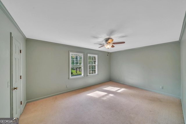 1706 Murphy Ln, Dublin, GA 31021 - carpeted spare room with a ceiling fan and ornamental molding