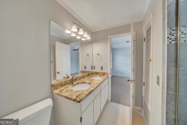 1706 Murphy Ln, Dublin, GA 31021 - bathroom featuring double vanity, tile patterned flooring, a closet, crown molding, and a ceiling fan