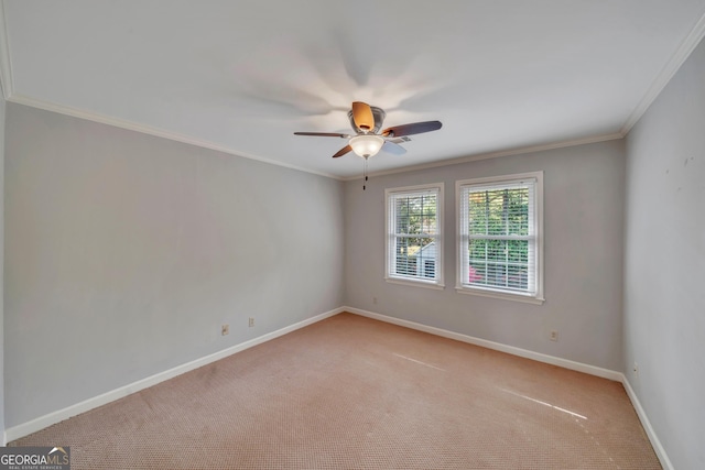 1706 Murphy Ln, Dublin, GA 31021 - spare room with ceiling fan, light colored carpet, and ornamental molding