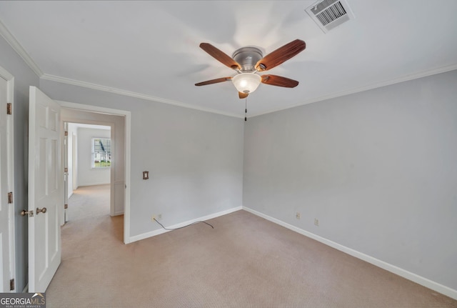1706 Murphy Ln, Dublin, GA 31021 - unfurnished room featuring light carpet, a ceiling fan, and ornamental molding