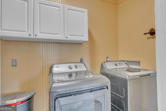 1706 Murphy Ln, Dublin, GA 31021 - washroom with cabinet space and washer and dryer