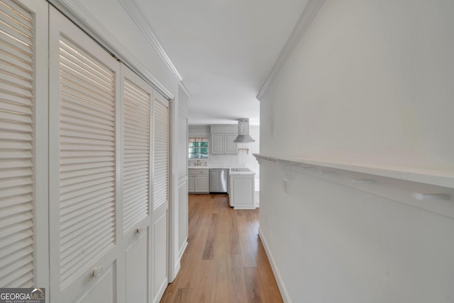 1706 Murphy Ln, Dublin, GA 31021 - corridor featuring crown molding and light wood finished floors