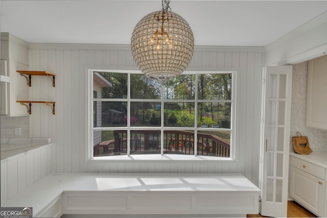 1706 Murphy Ln, Dublin, GA 31021 - unfurnished dining area featuring a chandelier and ornamental molding