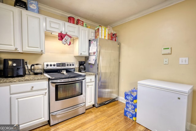 kitchen featuring stainless steel appliances, white cabinetry, crown molding, and light wood finished floors