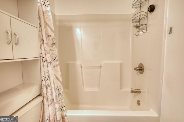 full bathroom with shower / tub combo with curtain