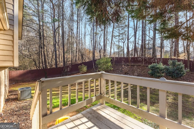 wooden deck with central AC unit