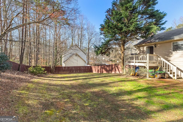 view of yard with a deck