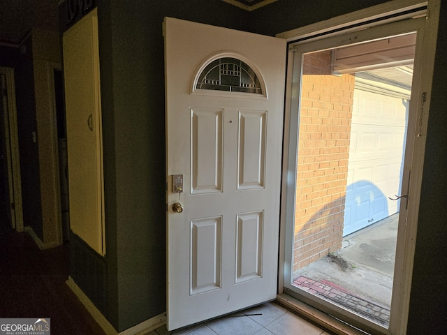 interior space featuring light tile patterned floors