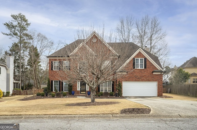 view of front of home featuring brick siding, a chimney, concrete driveway, an attached garage, and fence