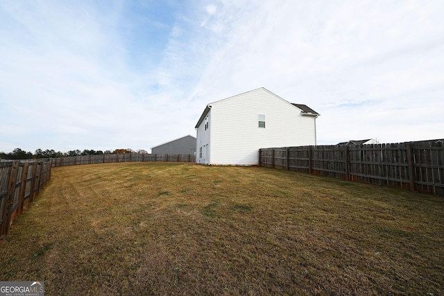 view of yard featuring a fenced backyard