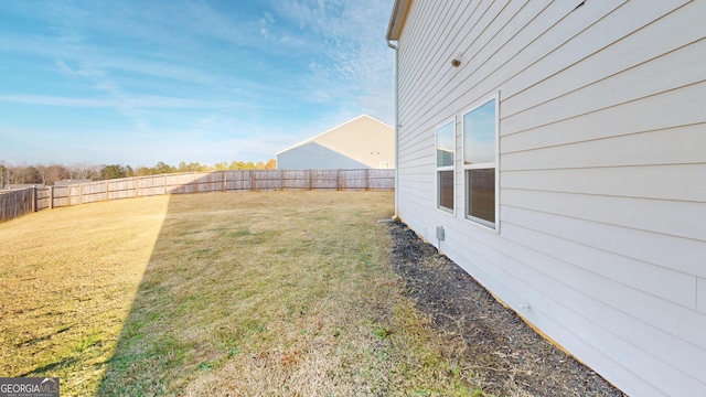 view of yard with a fenced backyard