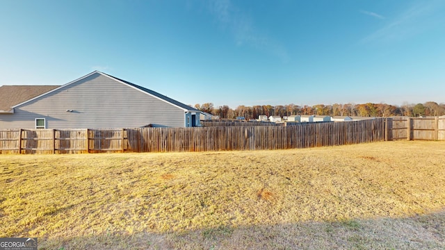 view of yard featuring a fenced backyard