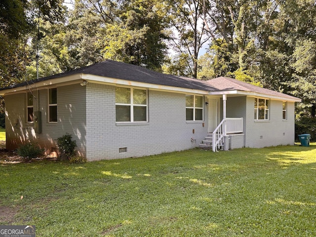 47 Elm St, Hampton, GA 30228 - ranch-style house with crawl space, brick siding, and a front lawn
