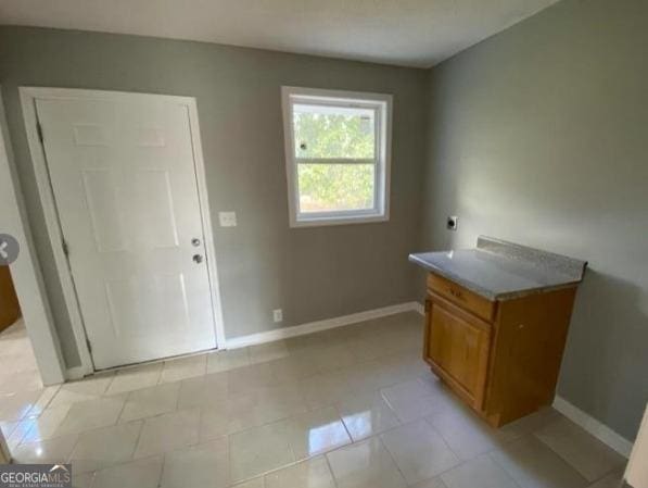 47 Elm St, Hampton, GA 30228 - laundry room featuring electric dryer hookup and baseboards