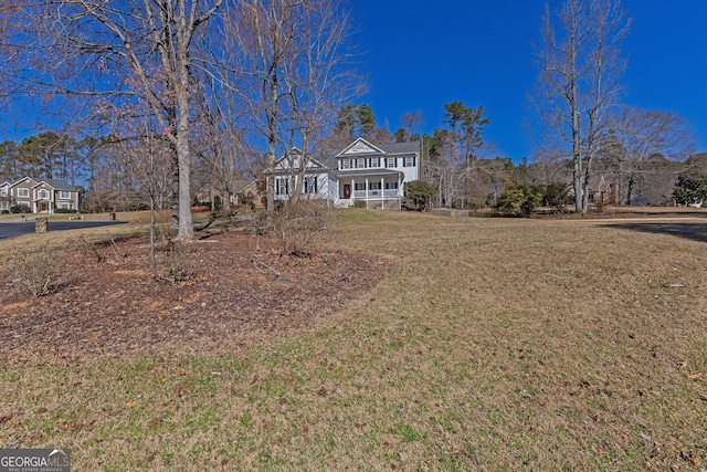 view of front of property with a front lawn