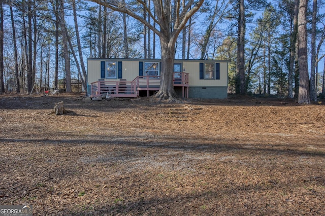 view of front of home with a deck