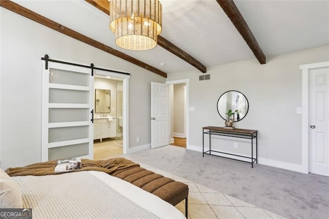 bedroom with connected bathroom, a chandelier, light carpet, a barn door, and lofted ceiling with beams