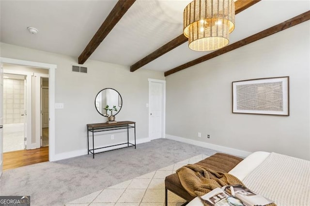 sitting room featuring light carpet, a notable chandelier, and beam ceiling