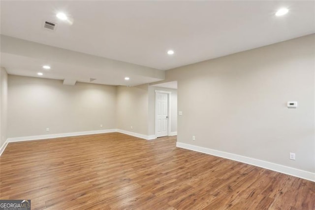 interior space with hardwood / wood-style flooring