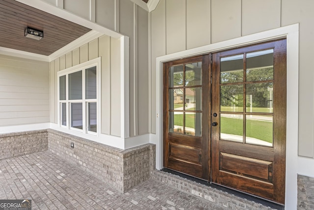 entrance to property featuring french doors