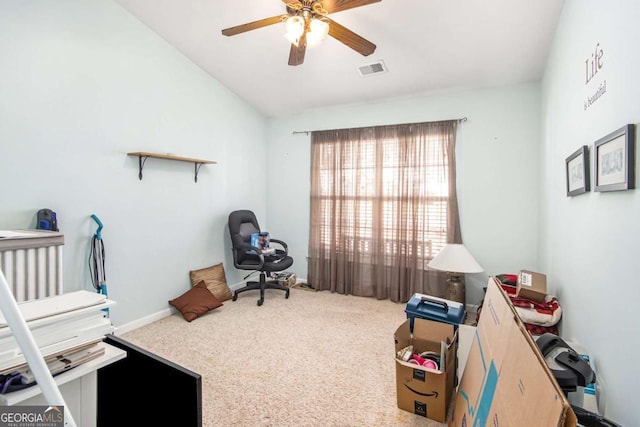 misc room with ceiling fan, carpet floors, and lofted ceiling