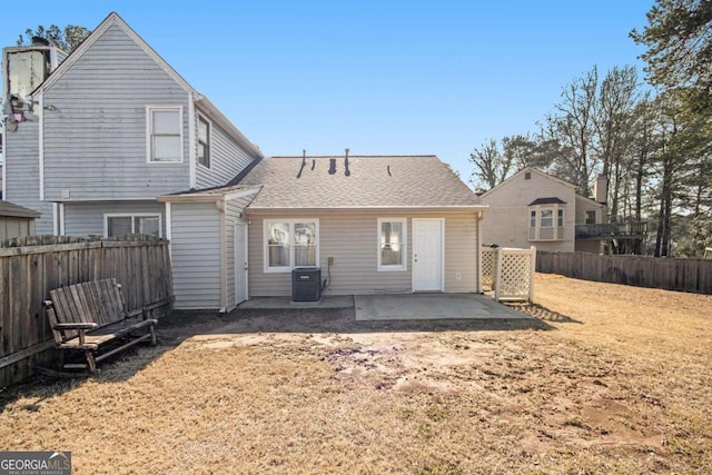 back of house featuring central air condition unit and a patio area