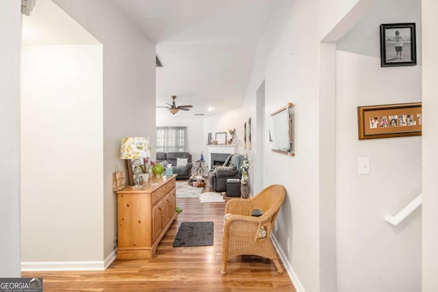 hall with light hardwood / wood-style floors