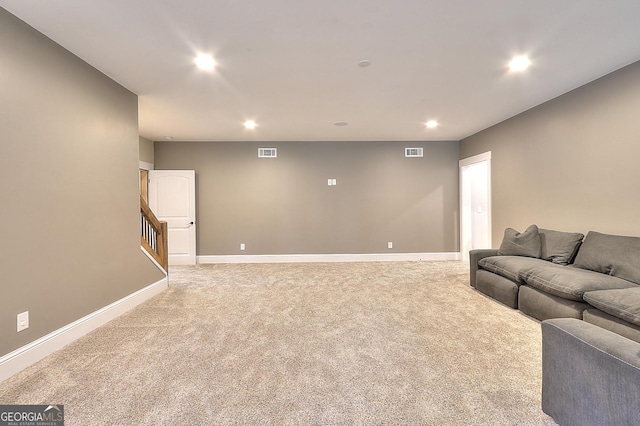 living room featuring light colored carpet