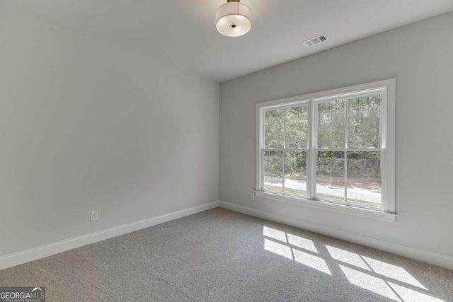 view of carpeted spare room