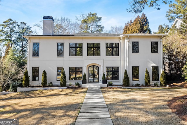 view of front of house with a front lawn