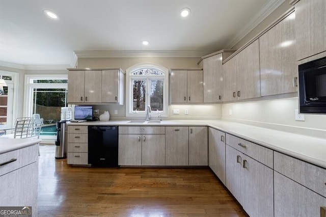 kitchen featuring plenty of natural light, sink, black appliances, and ornamental molding