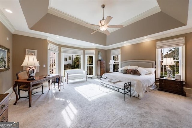 carpeted bedroom featuring a raised ceiling, ceiling fan, crown molding, and access to outside