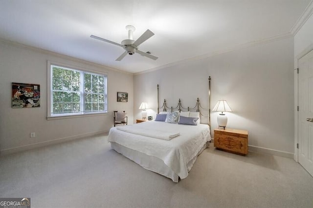 bedroom featuring light carpet, ceiling fan, and crown molding