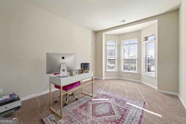 home office with light carpet