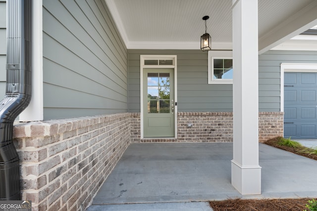 property entrance with a garage