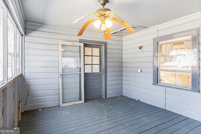 deck with a ceiling fan