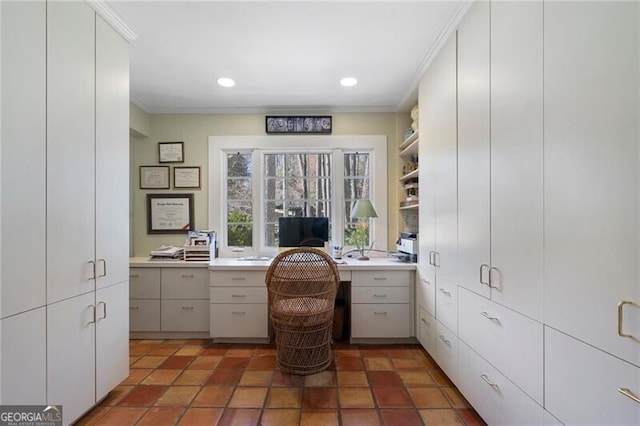 office area featuring crown molding