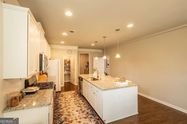 kitchen featuring a center island with sink, white cabinets, stainless steel appliances, and hanging light fixtures